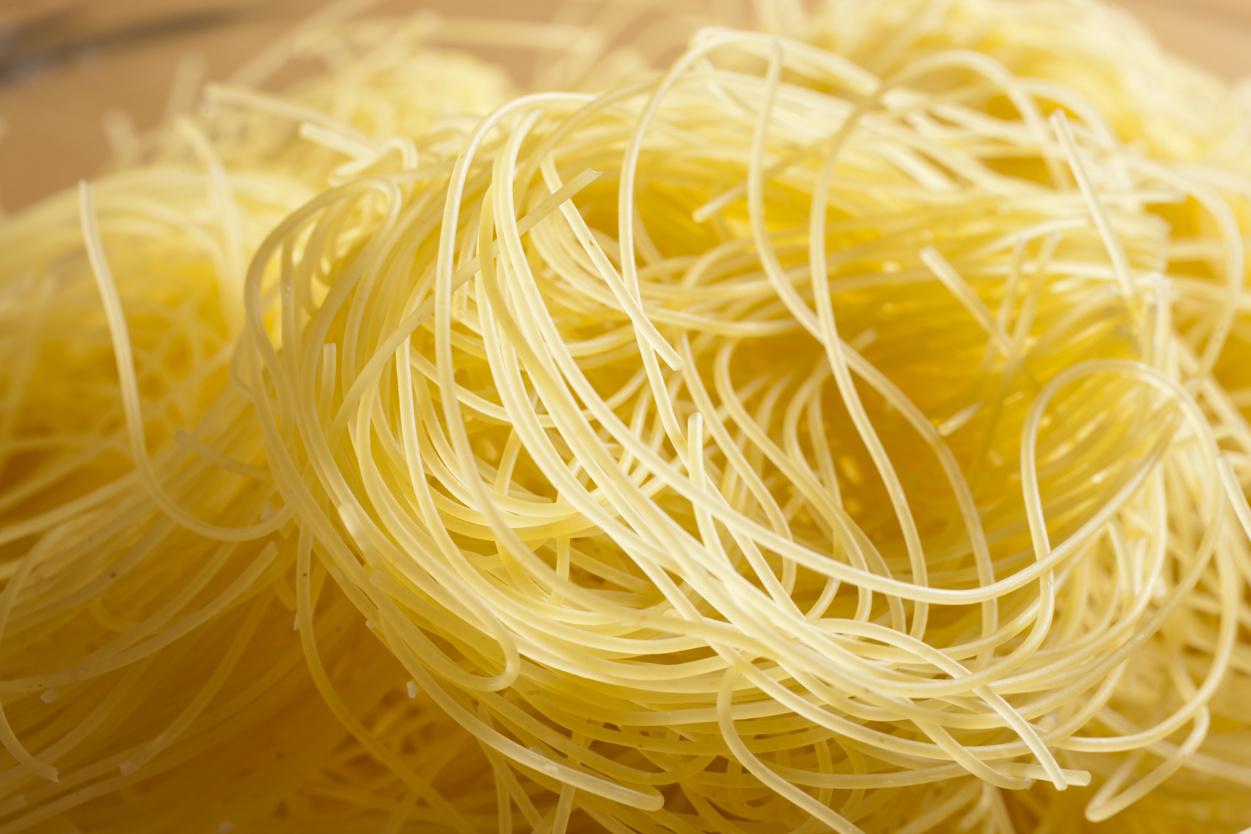 Close up of a dried nest of angel hair pasta