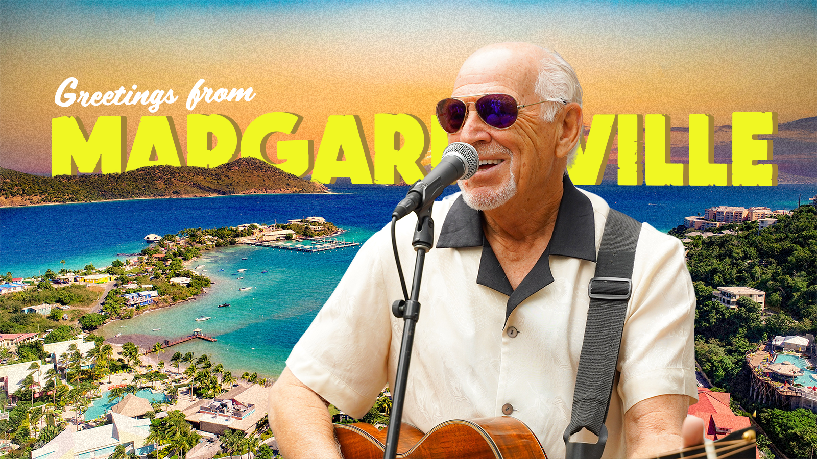 A man in sunglasses and a guitar in front of a microphone in front of a beachy background with the words “Greetings from Margaritaville” behind him.